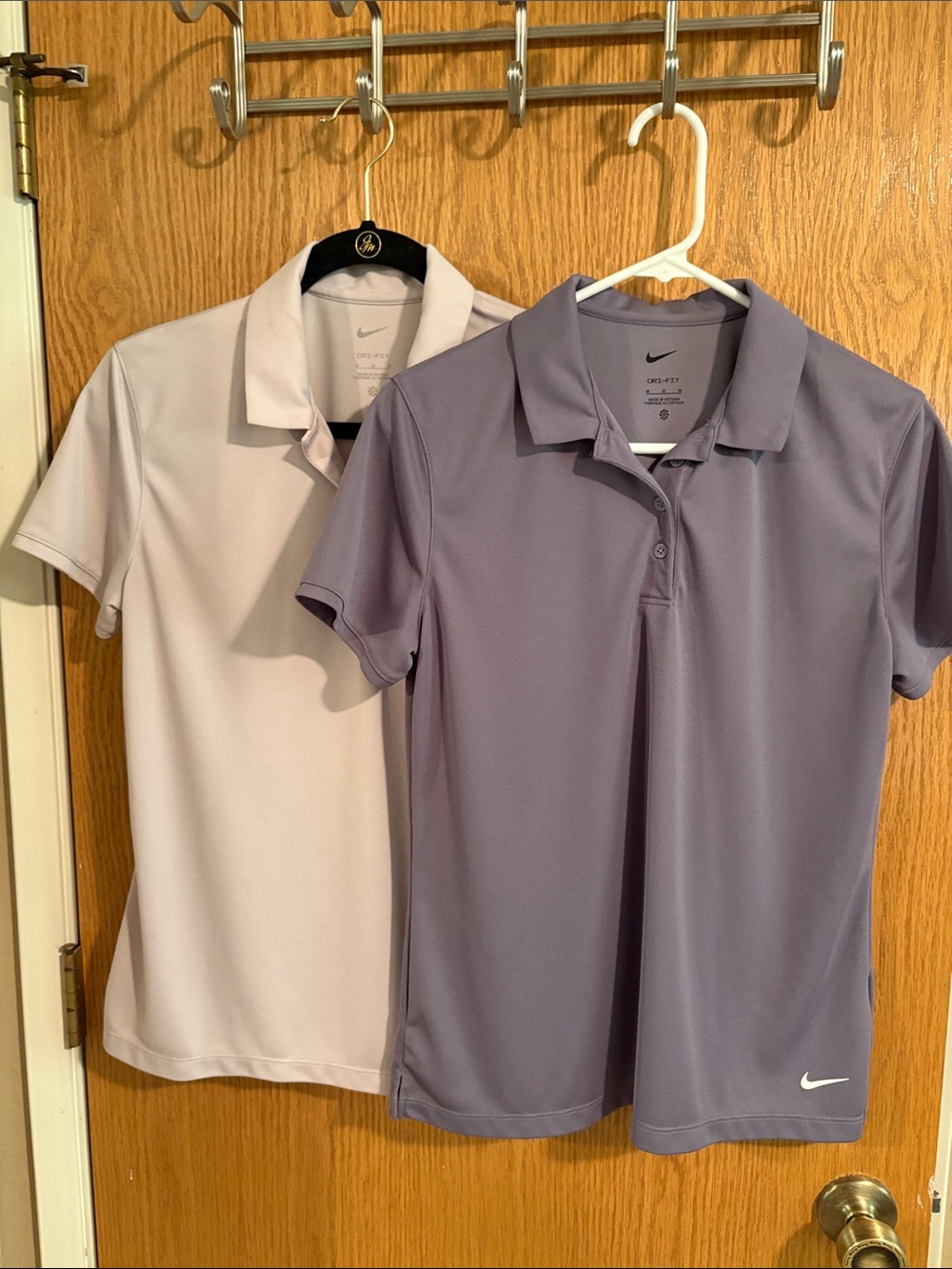 Two Nike Women’s Lavender and Taupe Short-Sleeve Golf Jerseys